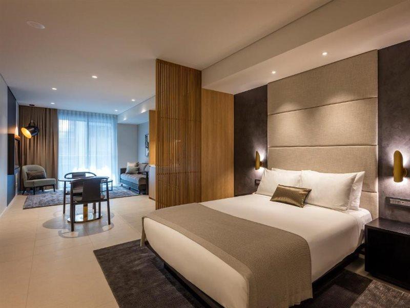 Skye Suites Cité de Sydney Extérieur photo A bedroom at the hotel