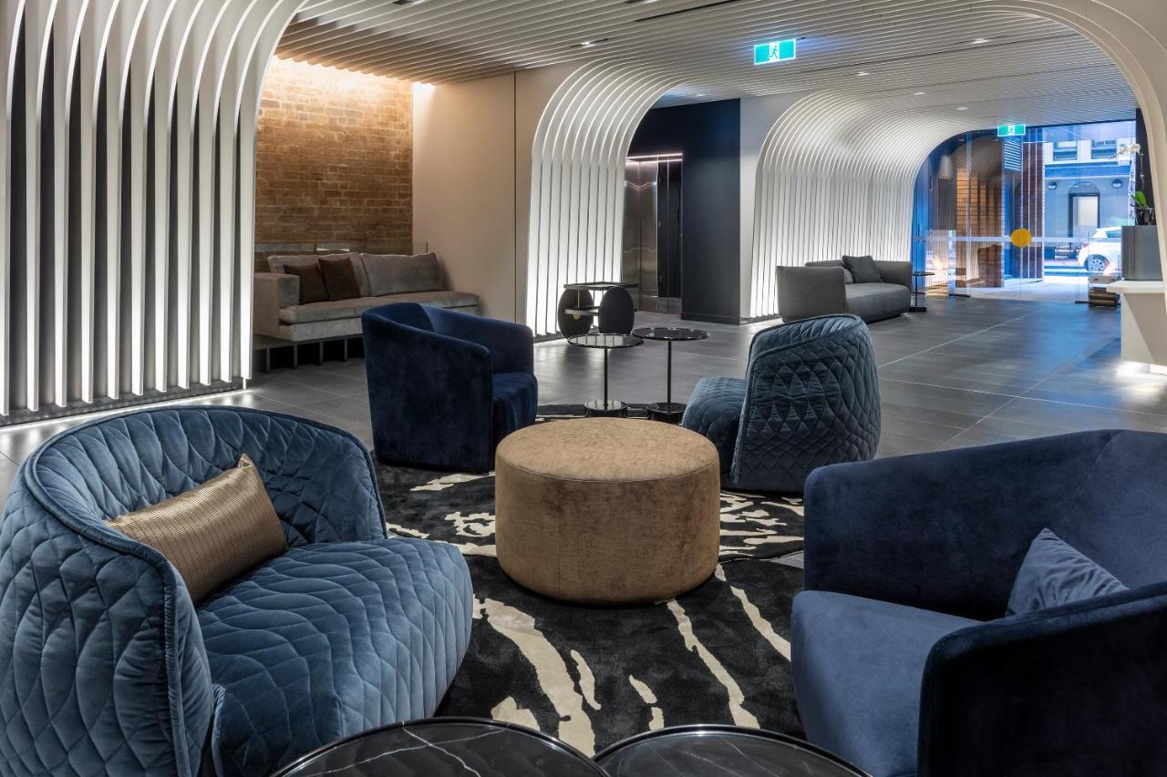Skye Suites Cité de Sydney Extérieur photo The lounge at the airport