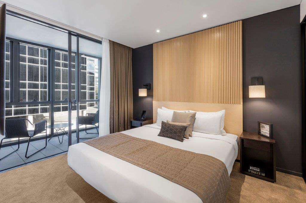 Skye Suites Cité de Sydney Chambre photo A bedroom at the hotel