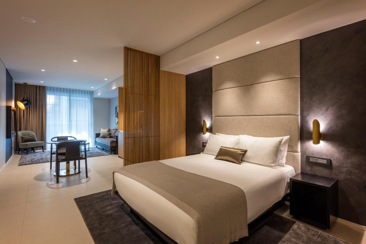 Skye Suites Cité de Sydney Extérieur photo A bedroom at the hotel